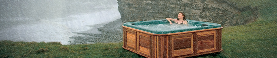 girl sitting in hot tub in the rain